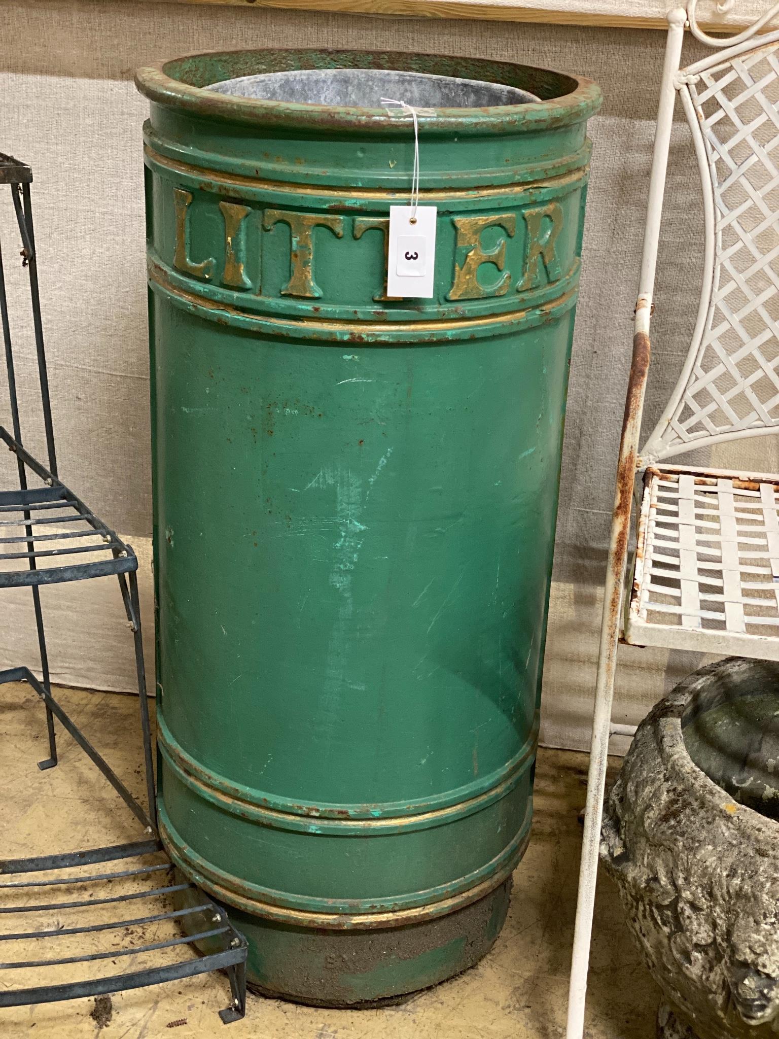 A green painted cast iron litter bin with zinc liner, height 86cm, diameter 40cm